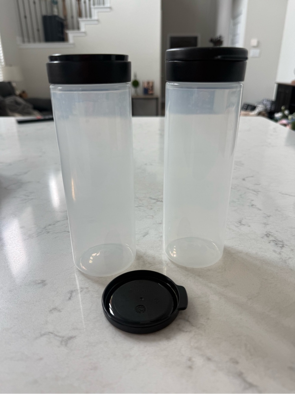 Tupperware Clear Plastic Storage Bottles with Black Lids - Set of 2